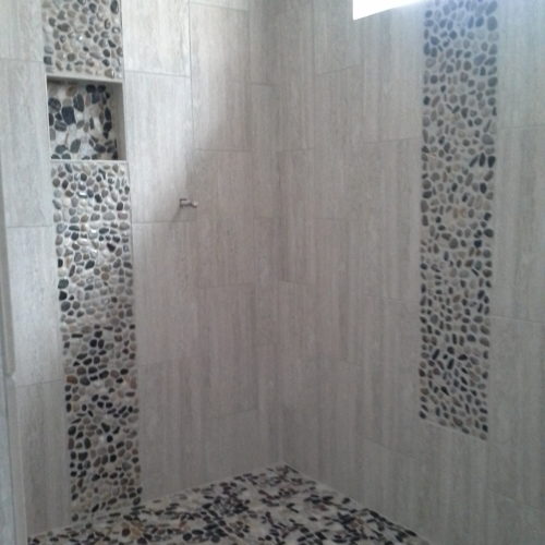 Tiled shower with natural lighting